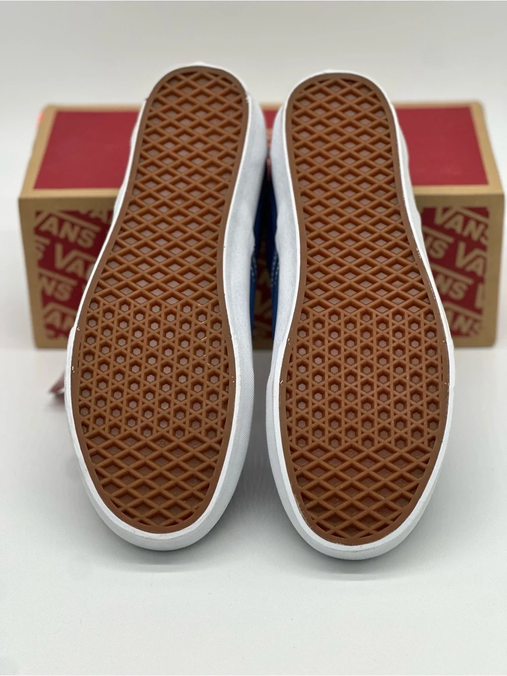 Vans Blue Plaid Slip-On Sneakers with Orange Accent